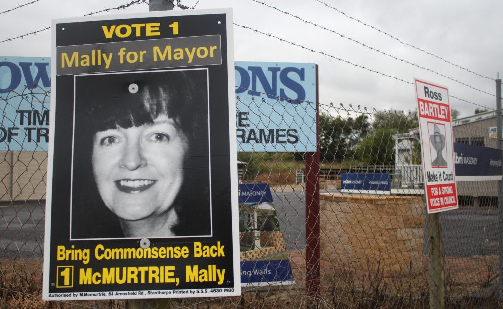 More than one sign per lot is breaking the rules according to local laws. 